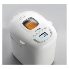 Pekač hljeba Gorenje, bijeli sa hljebom u unutrašjosti